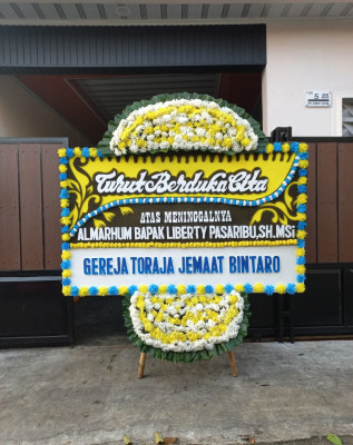 Papan Bunga Duka di Taraju