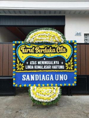 Papan Bunga Duka di Taraju